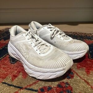 Hoka white athletic shoe